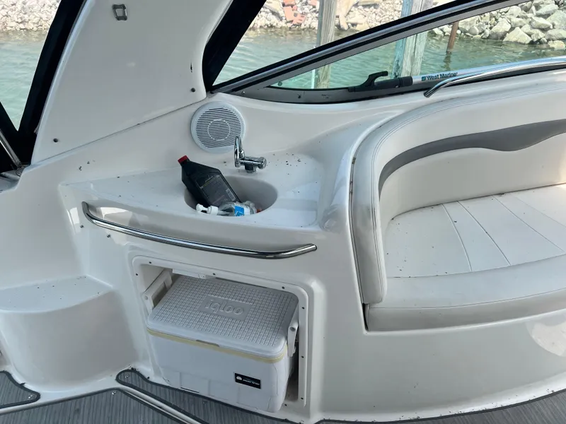 Slide: The Image of 2007 Chaparral Signature 280 boat interior with sink, cooler, and seating. - 12