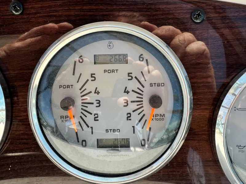 Slide: The Image of 2007 Chaparral Signature 280 boat tachometer gauge showing RPM and engine hours. - 18