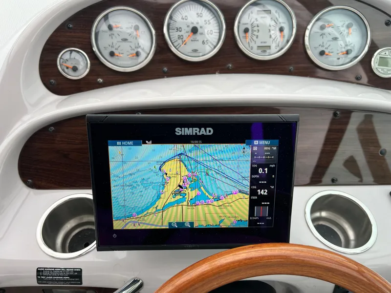 Slide: The Image of Dashboard of a 2007 Chaparral Signature 280 boat with Simrad navigation system. - 20