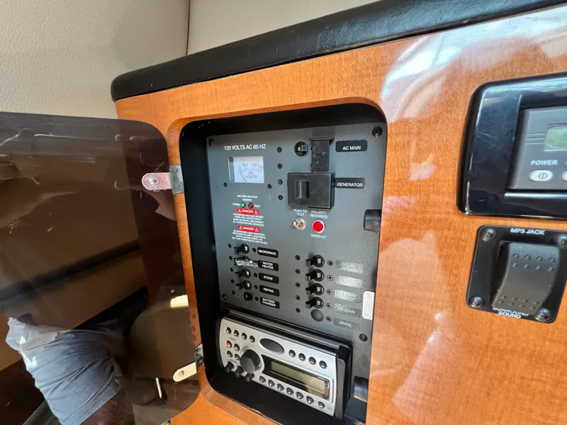 Slide: The Image of Electrical control panel of a 2007 Chaparral Signature 280 boat. - 26