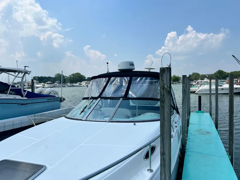 Slide: The Image of 2007 Chaparral Signature 280 docked at a marina on a sunny day. - 3