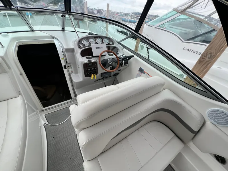 Slide: The Image of 2007 Chaparral Signature 280 boat interior with helm and seating. - 30