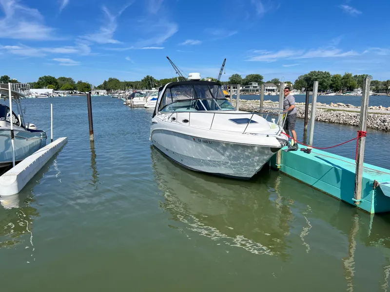 Slide: The Image of 2007 Chaparral Signature 280 docked at a marina on a sunny day. - 4