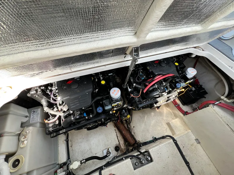 Slide: The Image of Engine compartment of a 2007 Chaparral Signature 280 boat with twin engines. - 46