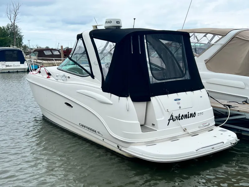 Slide: The Image of 2007 Chaparral Signature 280 boat docked in a marina. - 8