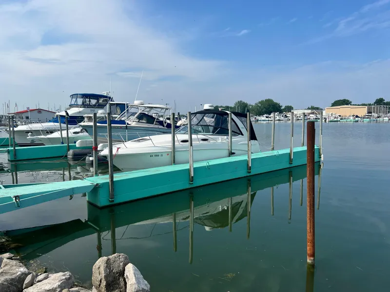 Slide: The Image of 2007 Chaparral Signature 280 docked at a marina on a sunny day. - 9