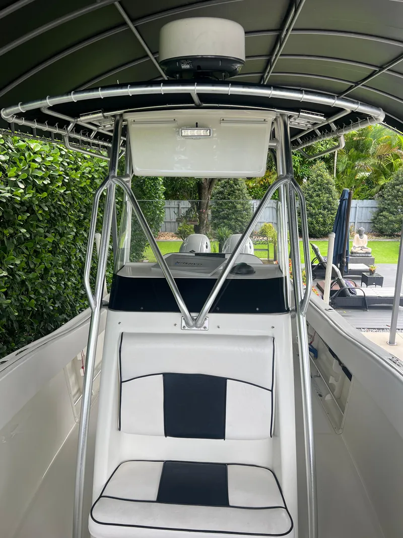 Slide: The Image of 2000 Hydra-Sports 2400 CC Vector center console boat with seating and canopy. - 11
