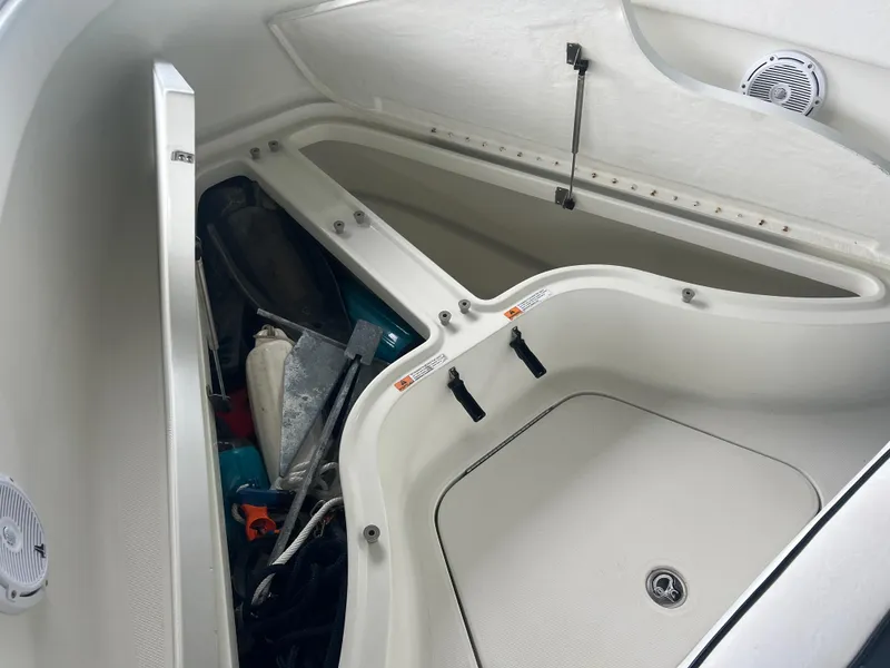 Slide: The Image of Hydra-Sports 2400 CC Vector 2000 model boat storage compartment with open hatches. - 23
