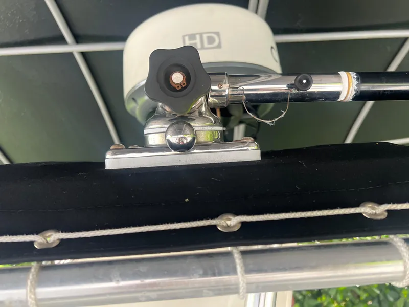 Slide: The Image of Close-up of a 2000 Hydra-Sports 2400 CC Vector boat's radar and rod holder. - 36