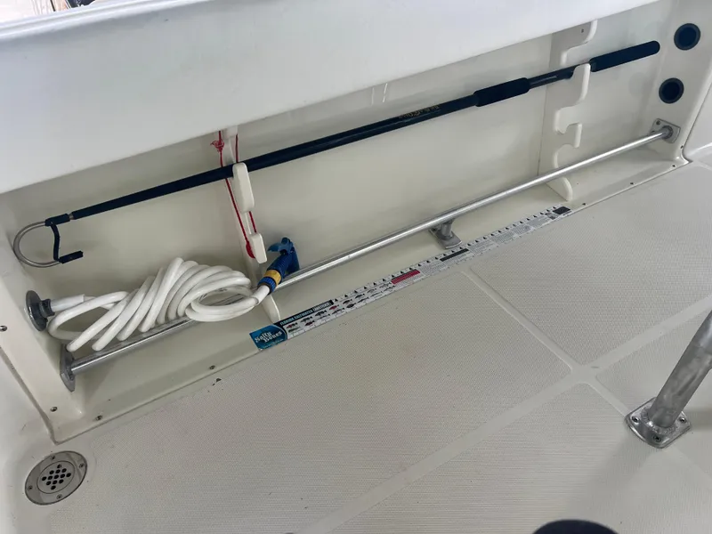 Slide: The Image of Hydra-Sports 2400 CC Vector 2000 boat deck with fishing rod and coiled rope. - 45