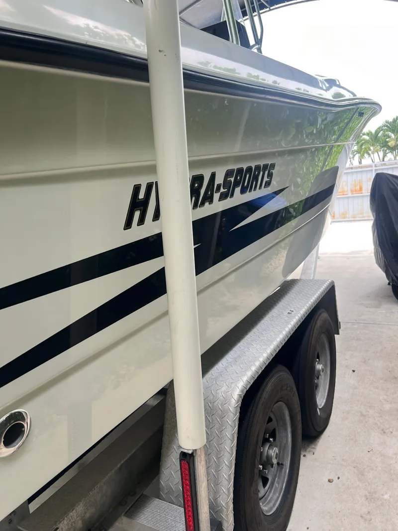 Slide: The Image of 2000 Hydra-Sports 2400 CC Vector boat on a trailer, side view. - 5