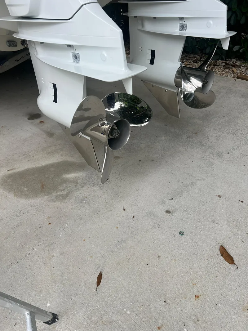 Slide: The Image of Twin outboard motors of a 2000 Hydra-Sports 2400 CC Vector boat. - 8