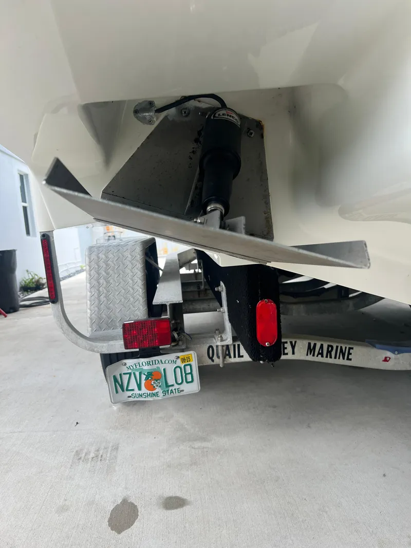 Slide: The Image of Rear view of a 2000 Hydra-Sports 2400 CC Vector boat on a trailer. - 9