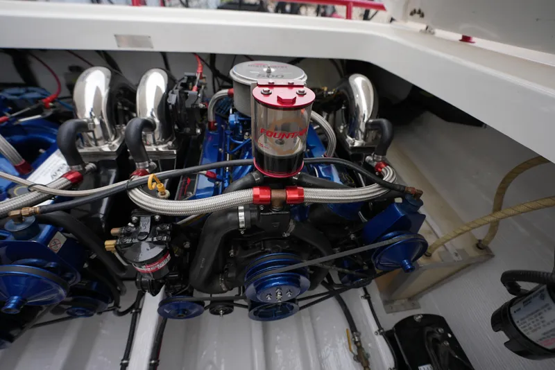 Slide: The Image of 1999 Fountain 35 Lightning engine compartment with high-performance components. - 10