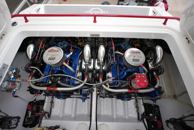 Slide: The Image of 1999 Fountain 35 Lightning boat engine compartment with twin MerCruiser 500 engines. - 12