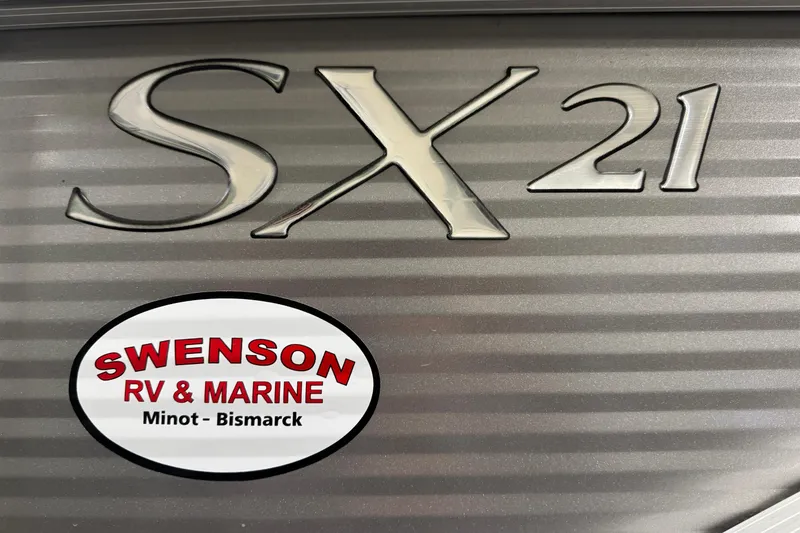 Slide: The Image of 2019 Bennington SX 21 Cruise logo with Swenson RV & Marine sticker. - 23