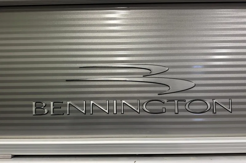 Slide: The Image of 2019 Bennington SX 21 Cruise logo on metallic surface. - 24