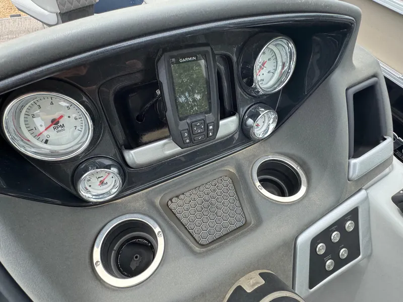Slide: The Image of 2019 Ranger Reata 200F boat dashboard with gauges and Garmin GPS. - 14