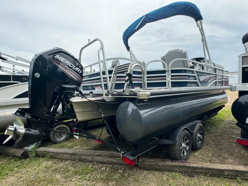Slide: The Image of 2019 Ranger Reata 200F pontoon boat with Mercury outboard motor on trailer. - 3