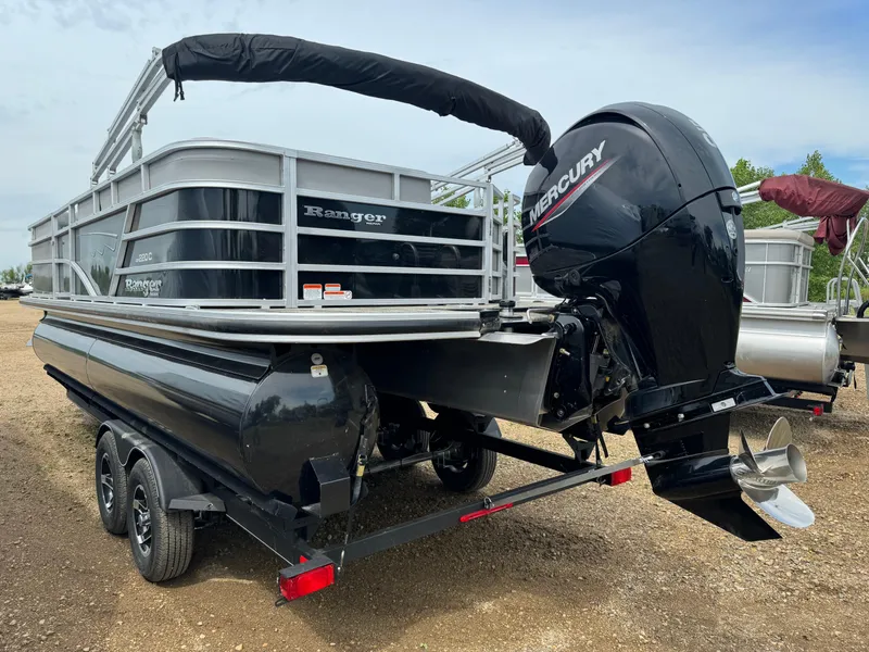 Slide: The Image of 2024 Ranger Reata 220C pontoon boat with Mercury outboard motor. - 4