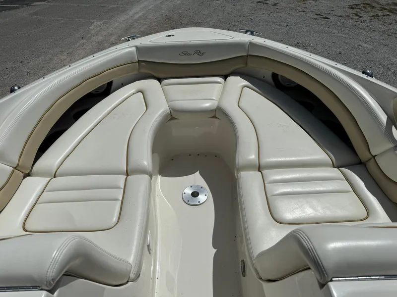 Slide: The Image of 2002 Sea Ray 290 Bow Rider boat with spacious seating area. - 12
