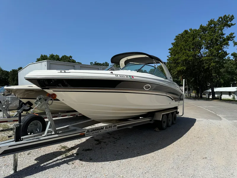 Slide: The Image of 2002 Sea Ray 290 Bow Rider on trailer, ready for transport. - 2