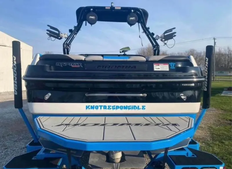 Slide: The Image of 2019 Moomba Craz boat rear view with Knotresponsible decal. - 7
