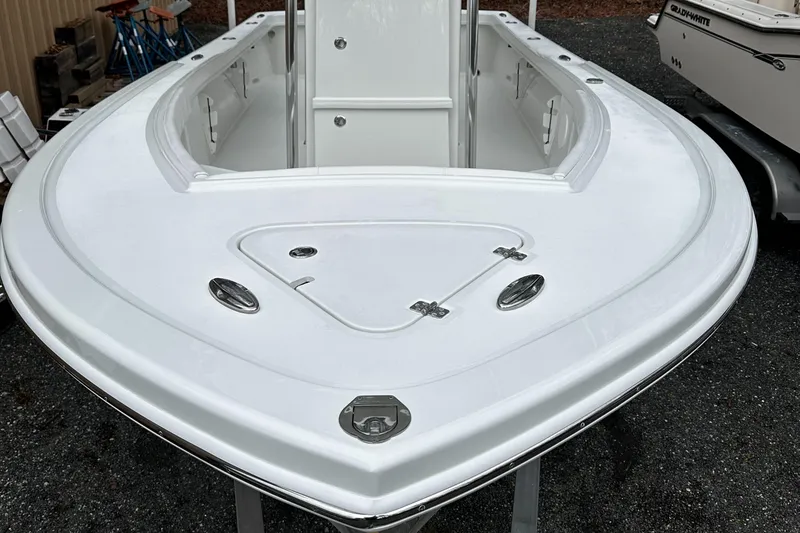 Slide: The Image of 2024 Pair Customs 21DV boat, front deck view, white finish, sleek design. - 10