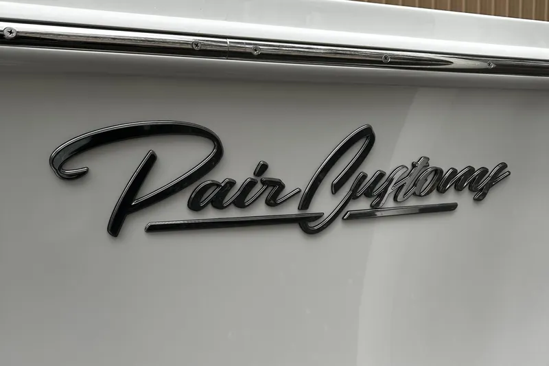 Slide: The Image of Pair Customs 21DV 2024 logo on boat exterior - 11