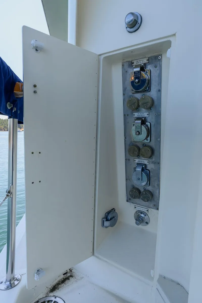 Slide: The Image of Electrical panel on 1987 Hatteras 72 Flush Deck Cockpit Motor Yacht. - 31