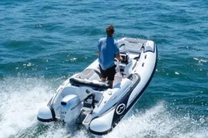 Slide: The Image of Walker Bay Generation 12 boat, 2025 model, cruising on open water. - 8