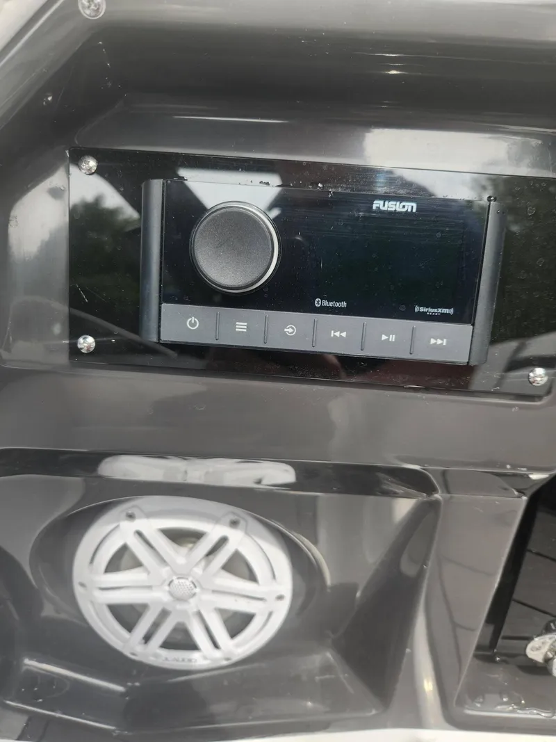 Slide: The Image of Fusion audio system and speaker in a 2022 Monterey 278SS boat. - 13