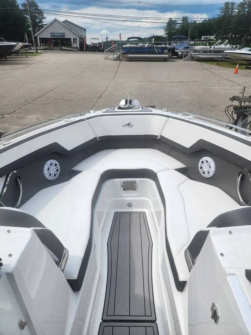 Slide: The Image of 2022 Monterey 278SS boat interior at a marina. - 6