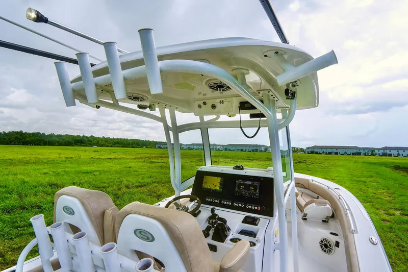 Slide: The Image of 2019 Sportsman Open 282 Center Console boat interior with advanced navigation system. - 13