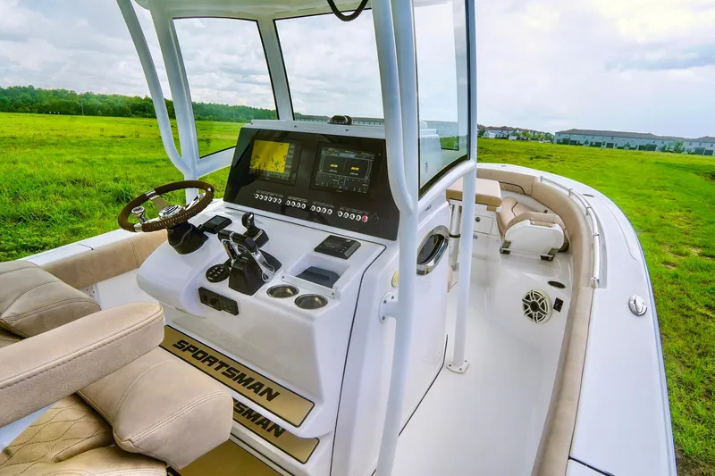 Slide: The Image of 2019 Sportsman Open 282 Center Console boat interior with advanced navigation system. - 15