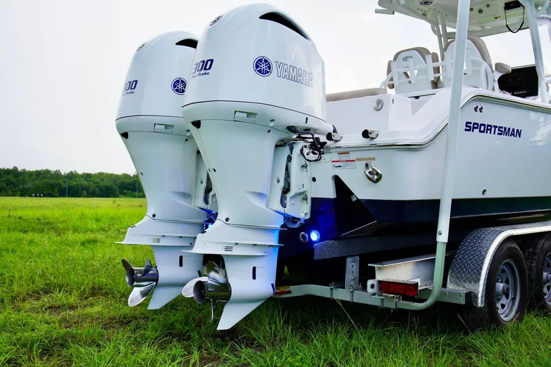 Slide: The Image of 2019 Sportsman Open 282 Center Console boat with twin Yamaha engines on trailer. - 28