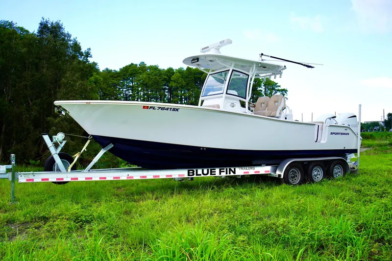 Slide: The Image of 2019 Sportsman Open 282 Center Console boat on Blue Fin trailer. - 3