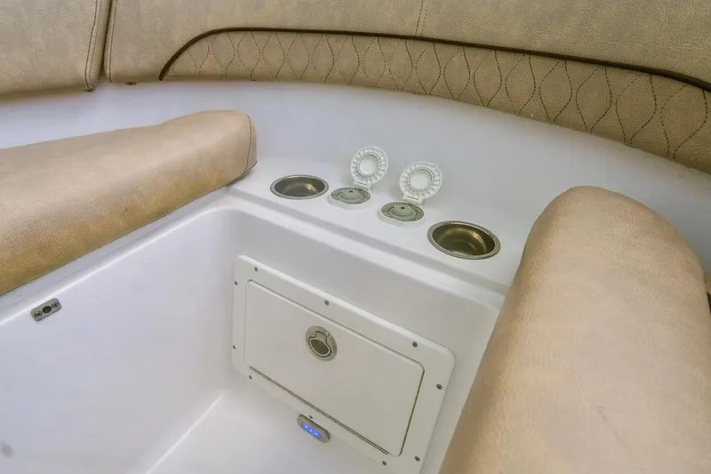 Slide: The Image of 2019 Sportsman Open 282 Center Console boat interior seating and storage. - 8