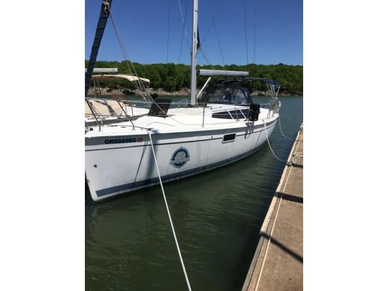 Slide: The Image of 2012 Hunter 36E sailboat docked in a marina. - 3