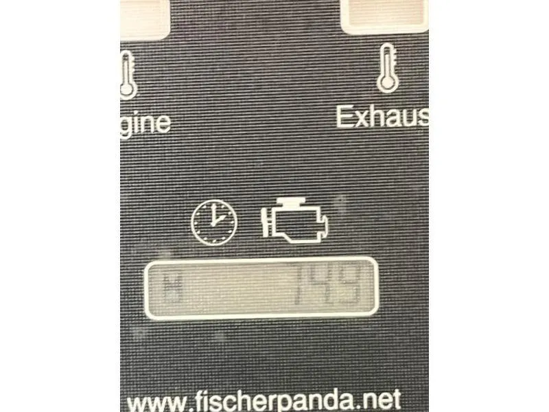 Slide: The Image of Control panel of a 2012 Hunter 36E displaying engine hours and warning light. - 4