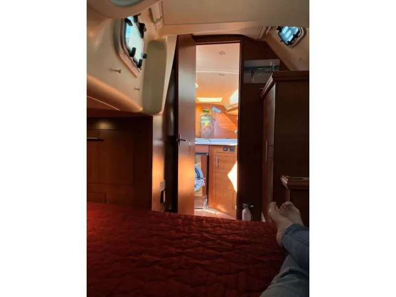 Slide: The Image of Interior of 2012 Hunter 36E sailboat, view from cabin bed towards galley. - 9
