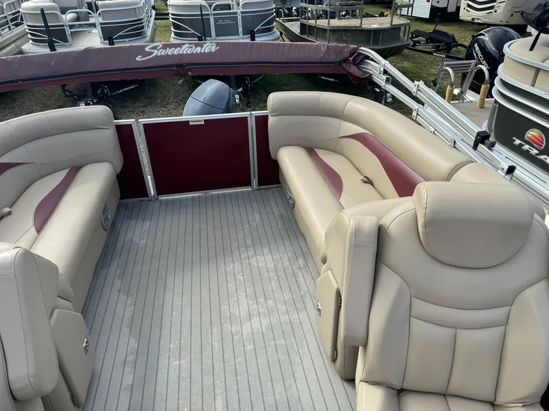 Slide: The Image of 2016 Godfrey Sweet Water pontoon boat with beige seating and maroon accents. - 13