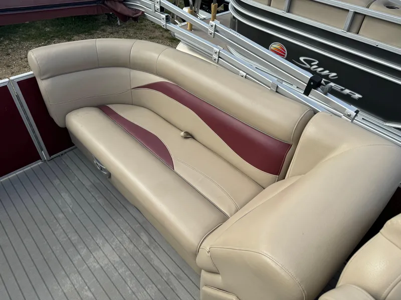 Slide: The Image of Beige and maroon seating on 2016 Godfrey Sweet Water boat deck. - 15