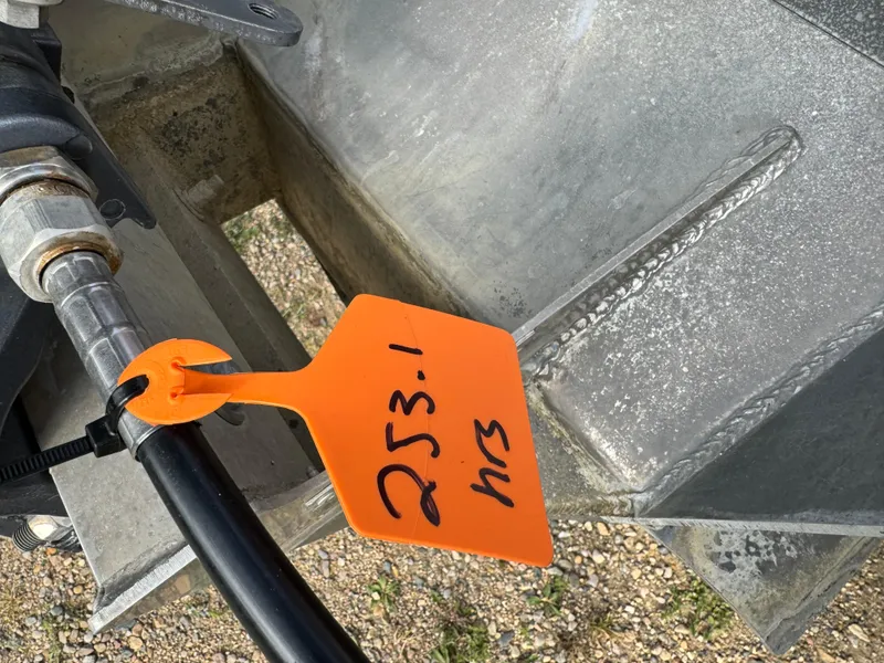 Slide: The Image of Orange tag on machinery with "253.1 hrs" written, Godfrey Sweet Water 2016 model. - 4