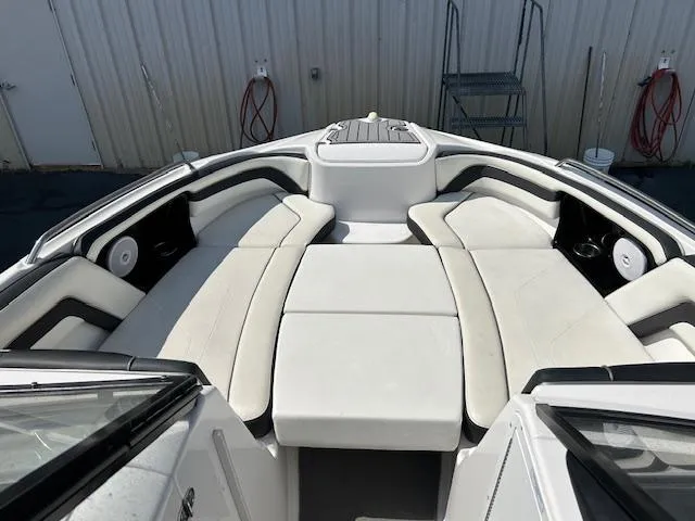 Slide: The Image of 2016 Yamaha Boats AR240 interior with spacious seating and modern design. - 3