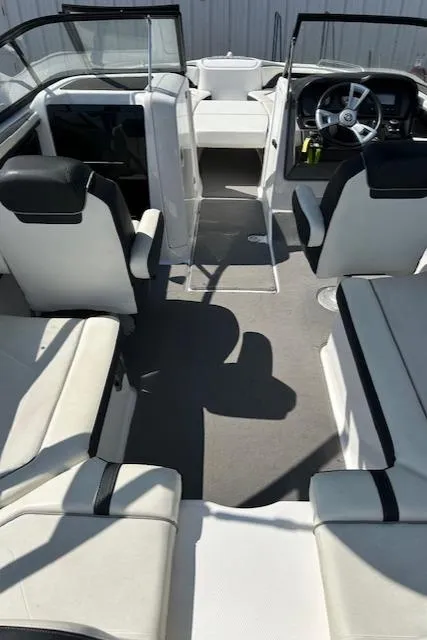 Slide: The Image of 2016 Yamaha Boats AR240 interior with seating and steering wheel. - 6