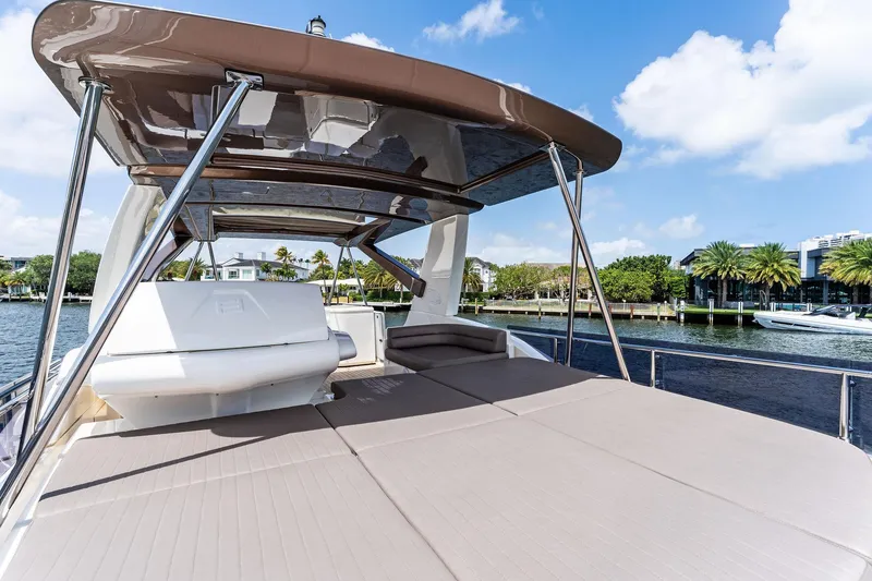 Slide: The Image of Luxurious 2015 Ferretti Yachts 690 with spacious deck and scenic waterfront view. - 34