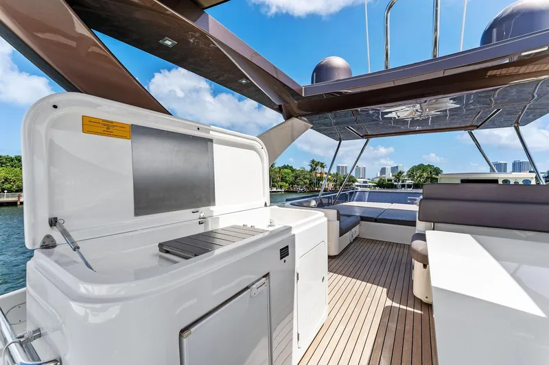 Slide: The Image of Luxurious 2015 Ferretti Yachts 690 deck with modern amenities and scenic views. - 36