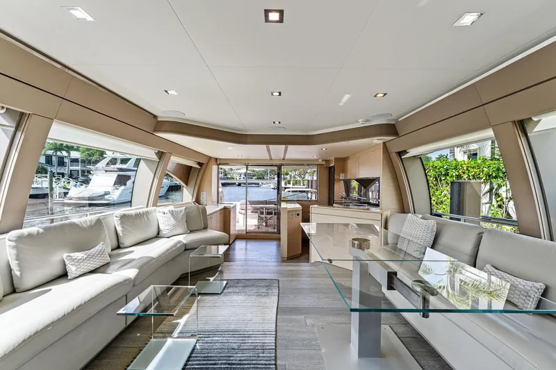 Slide: The Image of Luxurious interior of 2015 Ferretti Yachts 690 with modern furnishings and large windows. - 46