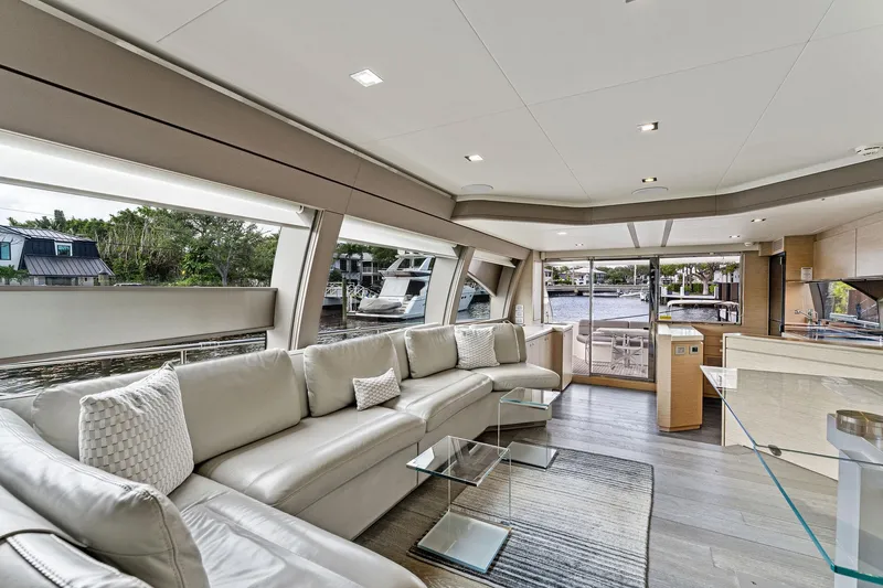 Slide: The Image of Luxurious interior of 2015 Ferretti Yachts 690 with modern furnishings and large windows. - 47